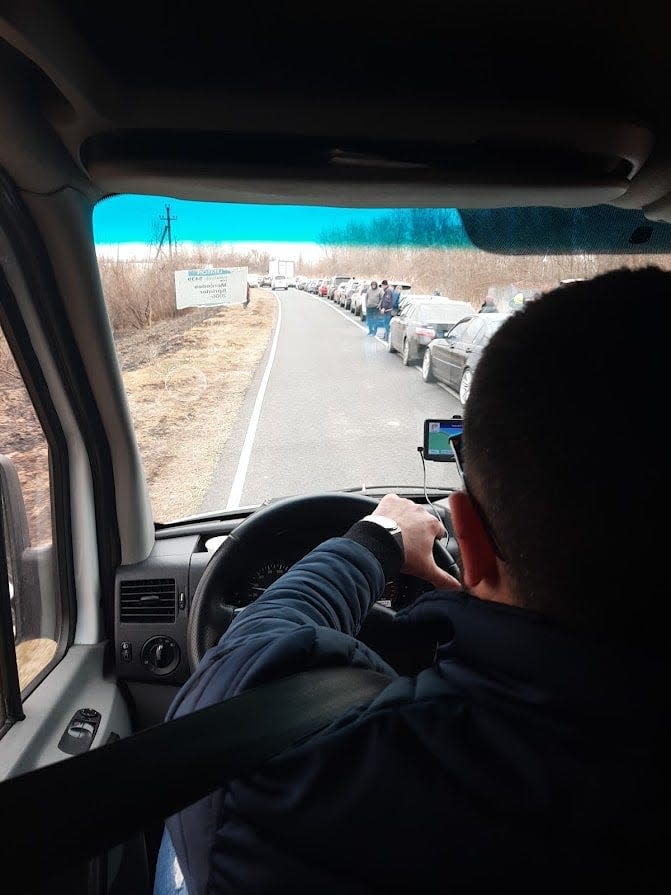 A line Bodi Klamph estimated to be nearly 2 miles at Orlivka, Ukraine full of refugees looking to cross the border by ferry into Romania.