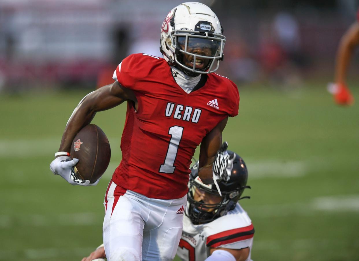 Vero Beach High School's Vandrevius Jacobs  escapes the grip of a South Fork defender as the Vero Beach High School Fighting Indians take on the South Fork Bulldogs on Friday, Aug. 26, 2022, at Billy Livings Field at the Citrus Bow in Vero Beach. Vero Beach won 54-6.  