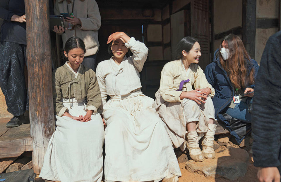 Minha Kim (third from left) says her proudest scenes from the first season were when Sunja bids farewell to her mother and her home: “That whole scene was so powerful and also beautiful.” - Credit: Courtesy of Juhan Noh/Apple TV+
