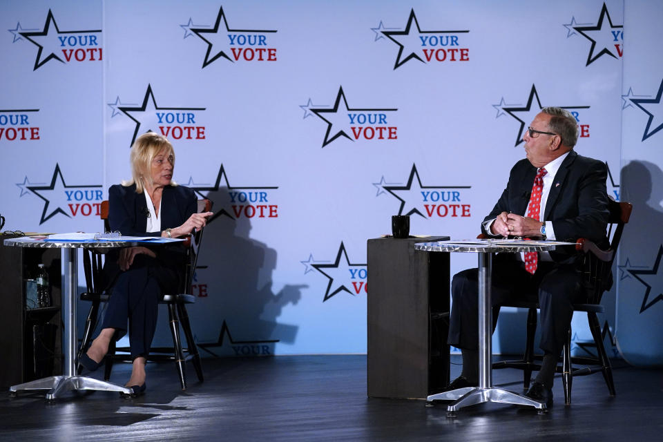 Gubernatorial candidates Democratic Gov. Janet Mills and Republican Paul LePage participate in a debate, Tuesday, Oct. 4, 2022, at the Franco Center in Lewiston, Maine. (AP Photo/Robert F. Bukaty)