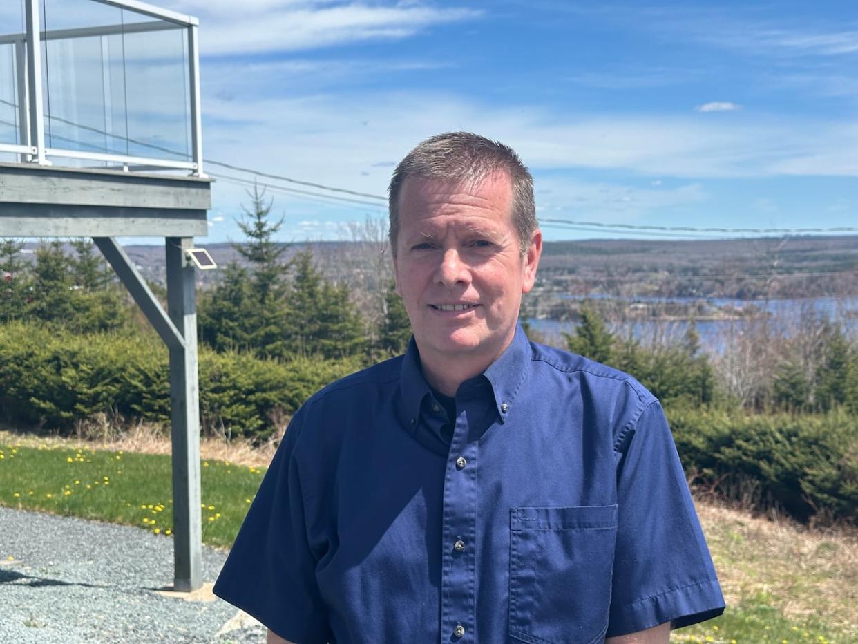 David Pilimer said Toni Avenue, the private road in Boutiliers Point where he and his wife purchased property in 2015 and built a home, was well maintained but that changed within a few years.  (Luke Ettinger/CBC - image credit)