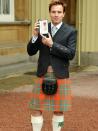 <p>Ewan McGregor received an OBE from the Queen in 2013 and the Scottish actor sported the traditional kilt for the honor—high knee socks and all. </p>