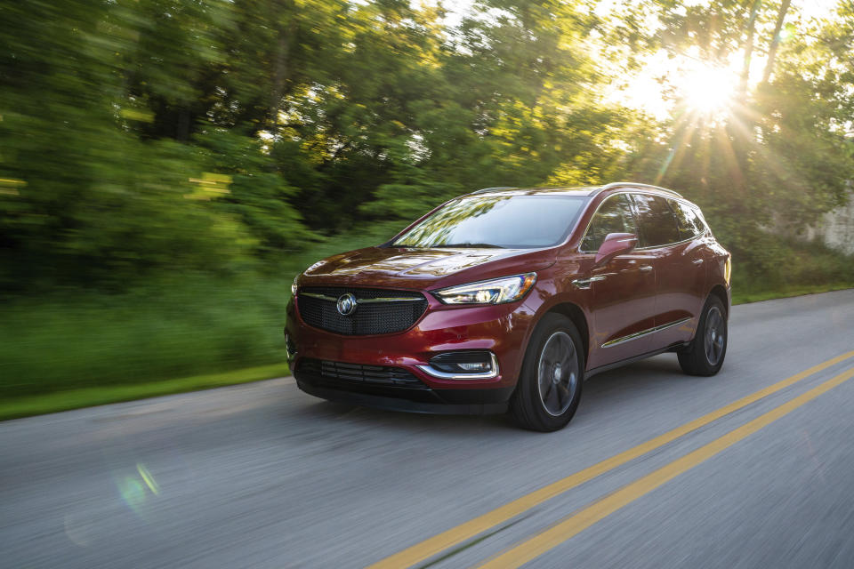 This undated photo from Buick shows the Enclave, a midsize three-row SUV that gets an EPA-estimated 21 mpg in mixed driving conditions. The Buick Enclave is related to another big General Motors SUV: the Chevrolet Traverse. Both provide a huge amount of cargo space for a three-row SUV, with the Enclave checking in at 23.6 (minimum) and 97.6 (maximum) cubic feet. (Courtesy of General Motors via AP)