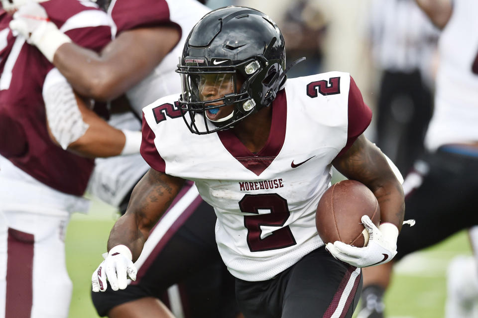 Sep 1, 2019; Canton, OH, USA; Morehouse Maroon Tigers running back Frank Bailey Jr. (2) runs the ball against the during the first half of the Black College Football Hall of Fame Classic at Tom Benson Hall of Fame Stadium. The Maroon Tigers are a member of the NCAA's Southern Intercollegiate Athletic Conference. Mandatory Credit: Ken Blaze-USA TODAY Sports