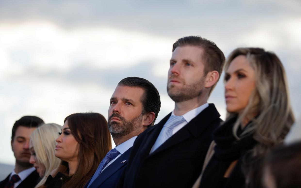 Donald Trump's family appear sombre as they watch his final speech as president - Reuters