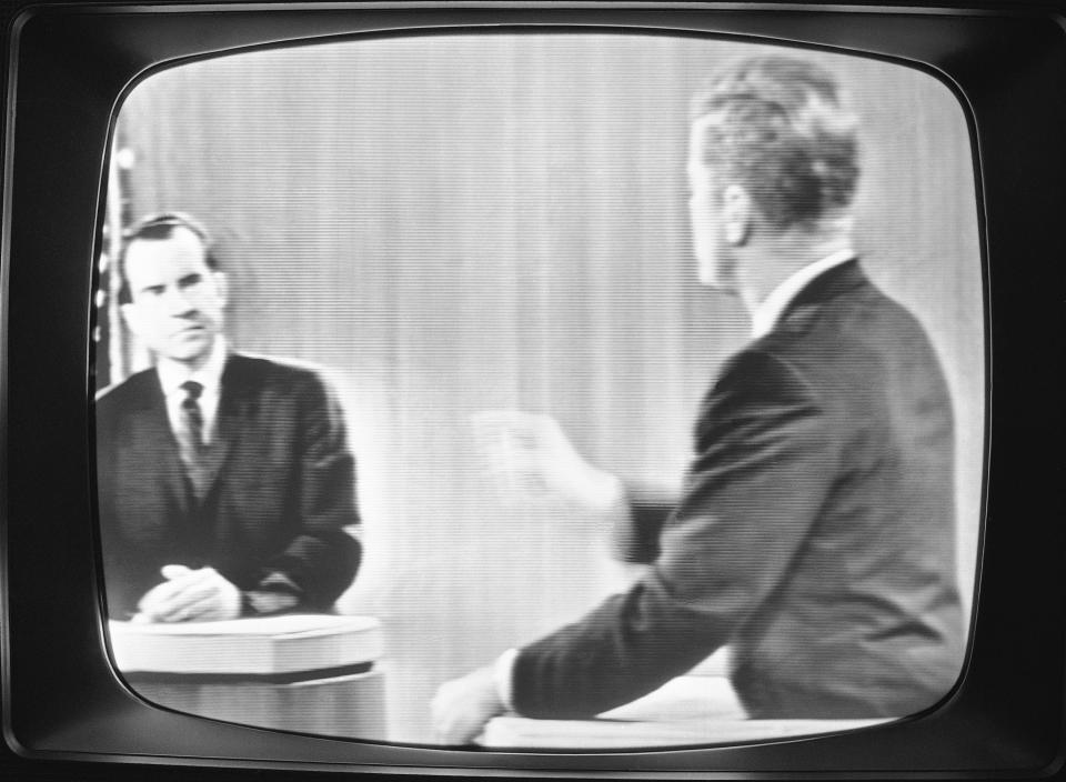 FILE - In this Oct. 21, 1960 file photo taken a television in New York displays a debate between Republican presidential candidate Vice President Richard M. Nixon, left, and Democratic presidential candidate Sen. John F. Kennedy, D-Mass. The 1960 presidential election offered the country's first televised debates. (AP Photo, File)