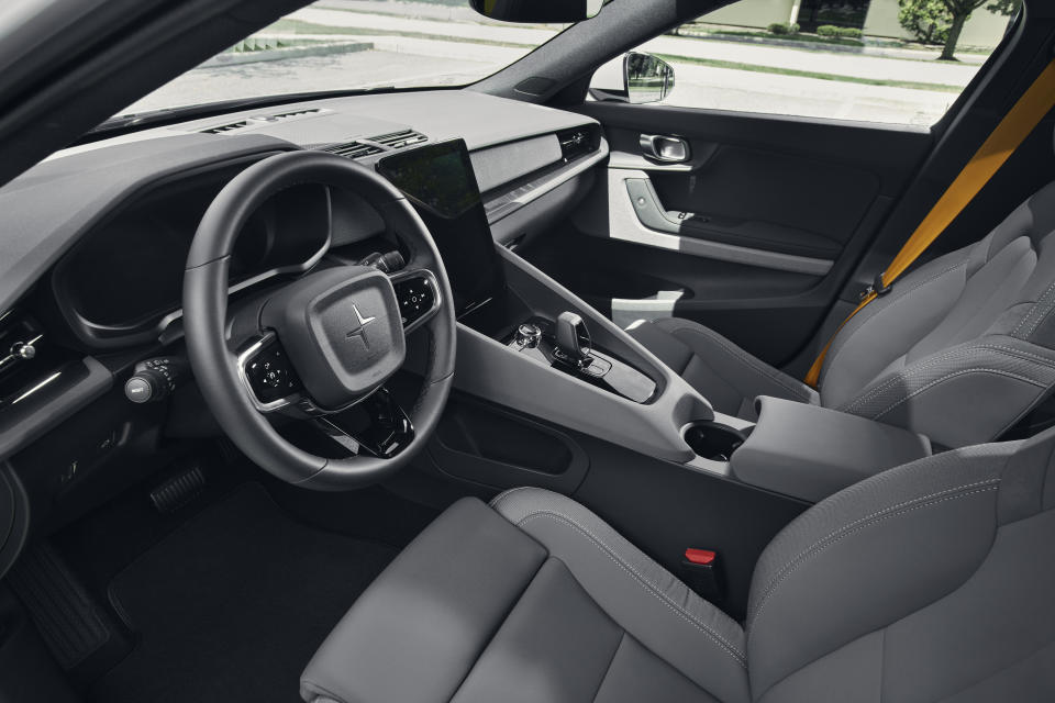 The front console has virtually no physical controls.