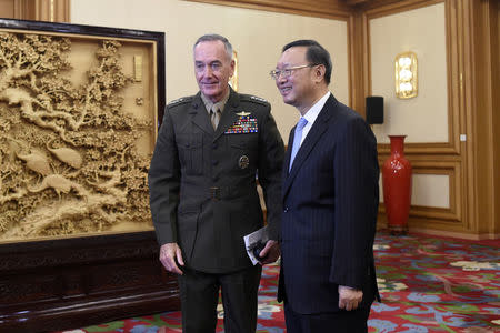 Chinese State Councillor Yang Jiechi meets General Joseph Dunford, chairman of the US Joint Chiefs of Staff at the Zhongnanhai Leadership Compound in Beijing on August 17, 2017. REUTERS/Wang/Zhao/Pool