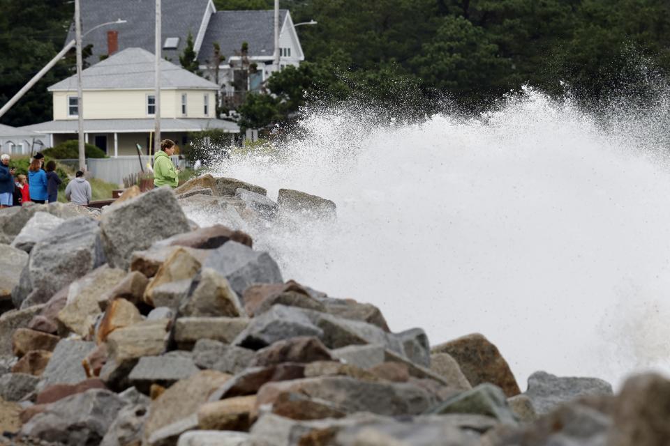 Waves crash against a seawall Saturday, Sept. 15, 2023, in Saco, Maine. Severe conditions were predicted across parts of Massachusetts and Maine, and hurricane conditions could hit the Canadian provinces of New Brunswick and Nova Scotia, where the storm, Lee, downgraded early Saturday from hurricane to post-tropical cyclone, was expected to make landfall later in the day. (AP Photo/Michael Dwyer)