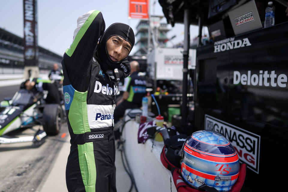 FILE - Takuma Sato, of Japan, prepares to drive during practice for the Indianapolis 500 auto race at Indianapolis Motor Speedway, May 18, 2023, in Indianapolis. Two-time Indy 500 winner Sato will re-join Rahal Letterman Lanigan Racing and go for a third title this year. If all goes as planned, he would drive the Honda-powered No. 75 car on May 26, 2024. (AP Photo/Darron Cummings, File)