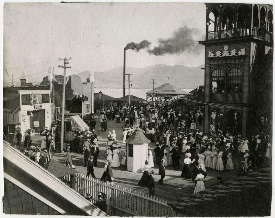 Photo showing crowds on the walkways at Saltair Resort, in 1908. | J. Willard Marriott Library, University of Utah