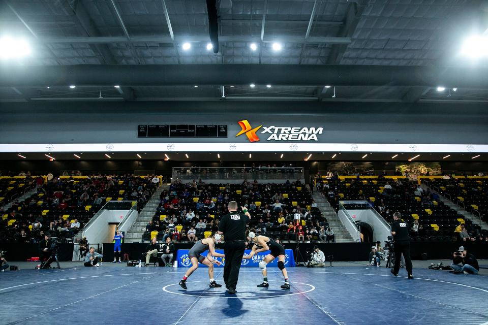 Ankeny's Trever Anderson, left, wrestles DeKalb's Danny Aranda at 120 pounds during the finals of the Dan Gable Donnybrook high school wrestling tournament, Saturday, Dec. 4, 2021, at the Xtream Arena in Coralville, Iowa.