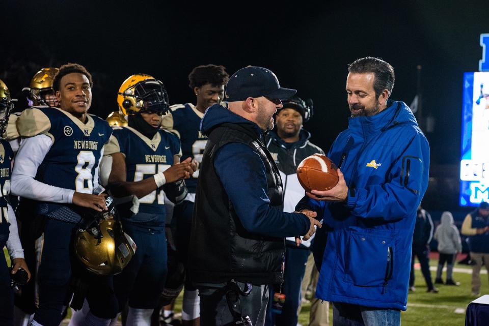 Newburgh celebrates their win during the NYSPHSAA Class AA semifinal football game in Middletown on Saturday, November 26, 2022.