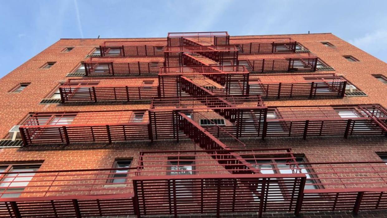 <div>Low angle view of apartment fire escape, Queens, New York. (Photo by: Lindsey Nicholson/UCG/Universal Images Group via Getty Images)</div>