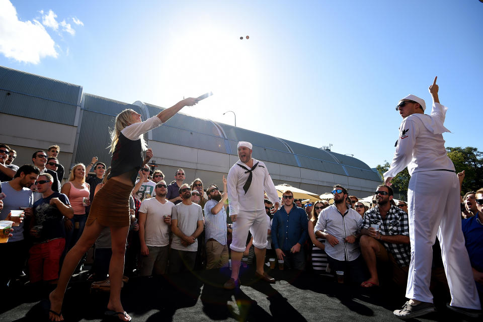 Patrons take part in a traditional game of two-up on Anzac Day, at the Australian Hotel in Sydney. Source: AAP