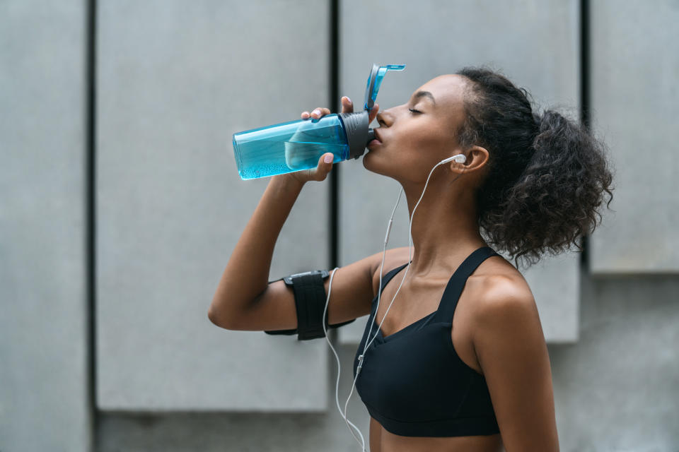 A good workout is a great way to increase your thirst ... and your water intake. (Photo: Getty Creative)