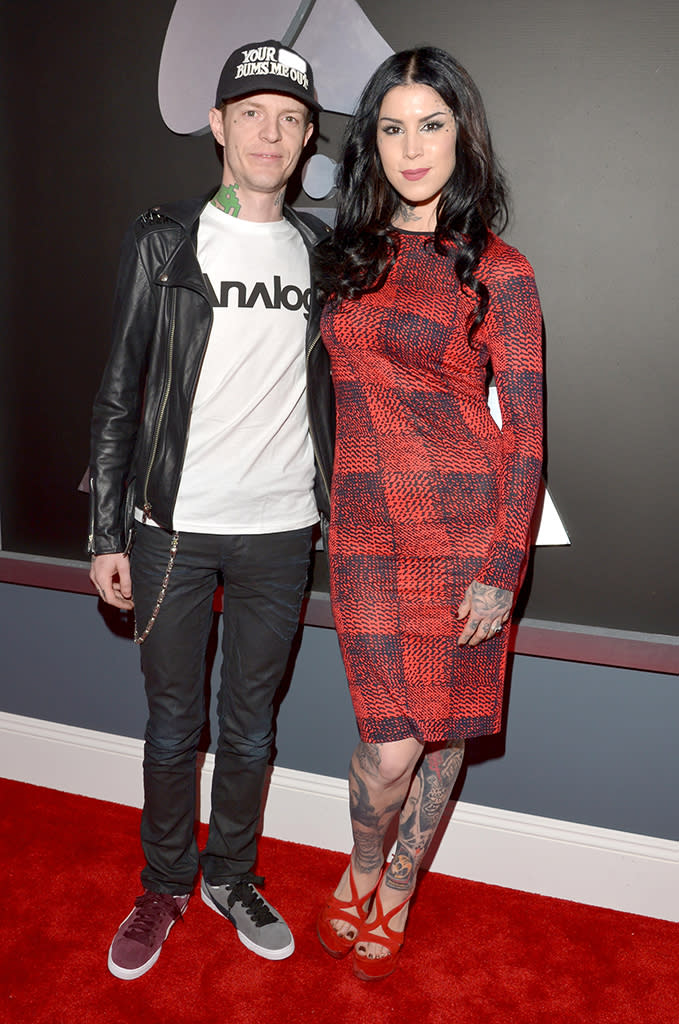 <b>Deadmau5 and Kat Von D</b><br> <b>Grade: C</b><br> Lovebirds Deadmau5 and Kat Von D kept it casual. While the electronic musician stayed true to his style sporting a white T-shirt, black leather jacket, mismatched kicks, and a hat that said “Your S**t Bums Me Out,” the tattoo artist proudly showed off her inked legs in a red-and-black patterned Derek Lam frock and matching red platforms.