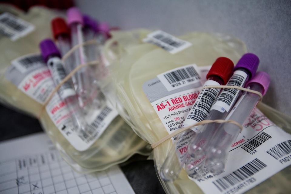 Blood donation bags on a Blood Connection bus at Archetype June 15, 2021.