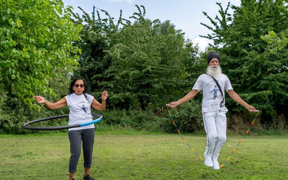 Pritpal with her husband Rajinder, who are both determined to keep their fitness levels up - Andrew Crowley for The Telegraph