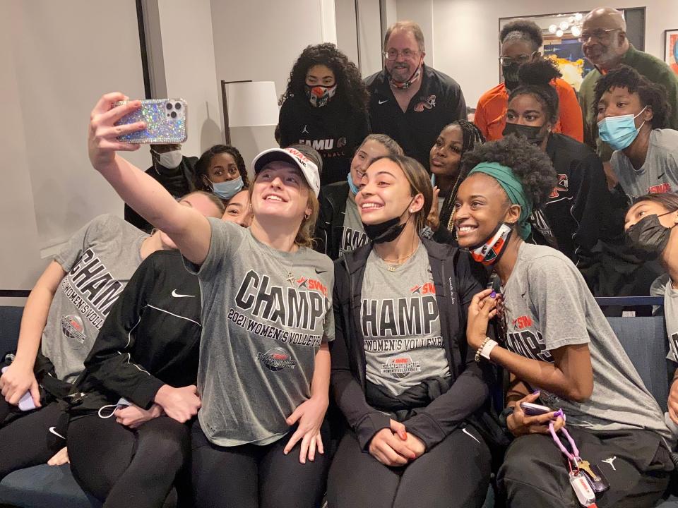 FAMU libero Jessa Long takes a selfie of the team upon hearing the news of their matchup in the NCAA volleyball tournament during a selection show watch party at the Hyatt House on Sunday, Nov. 28, 2021.