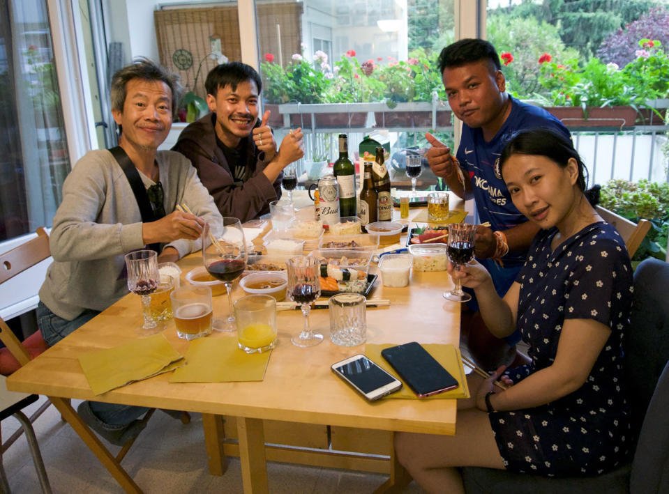 In this Thursday, Aug. 1, 2019, photo taken and provided by Junya Yimprasert, members of the band Faiyen, from top left to right, Trairong Sinseubpol, Romchalee Sombulrattanakul, front left to right Nithiwat Wannasiri, Worravut Thueakchaiyaphum, pose for a group photo after lunch in Paris, France. The members of the Thai folk music group who feared for their lives because of their fiercely antiestablishment songs are celebrating being admitted to France to seek refugee status. The band fled to Thailand's neighbor Laos after a military government took power in Bangkok in 2014. Faiyen said they received constant death threats and issued urgent pleas for help to move to a safer refuge. They and their supporters said Tuesday, Aug. 6, they are now in Paris, and plan a protest at the Thai Embassy.(Junya Yimprasert via AP)