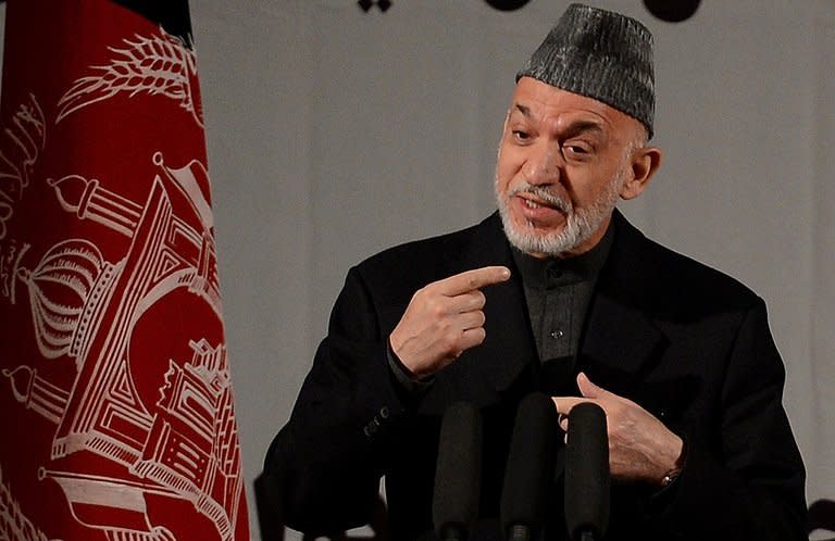 Afghan President Hamid Karzai speaks at a gathering of women to mark International Women's Day, in Kabul on March 10, 2013. The US commander in Afghanistan has warned troops that they face an increased threat of attack after a series of inflammatory anti-US comments by Karzai