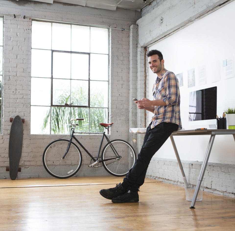 man standing in a loft