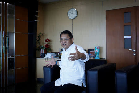 Indonesia's Minister of Communication and Information Technology, Rudiantara, gestures during an interview with Reuters at his office in Jakarta, Indonesia August 9, 2018. REUTERS/Willy Kurniawan