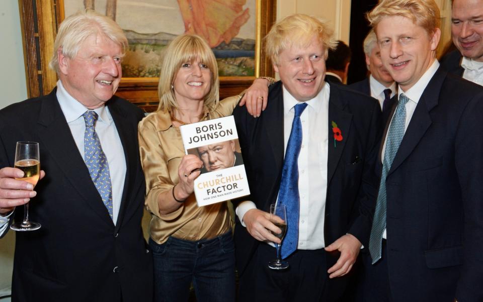 Stanley stands with Rachel, Boris and Jo Johnson - David M. Benett/Getty Images Europe