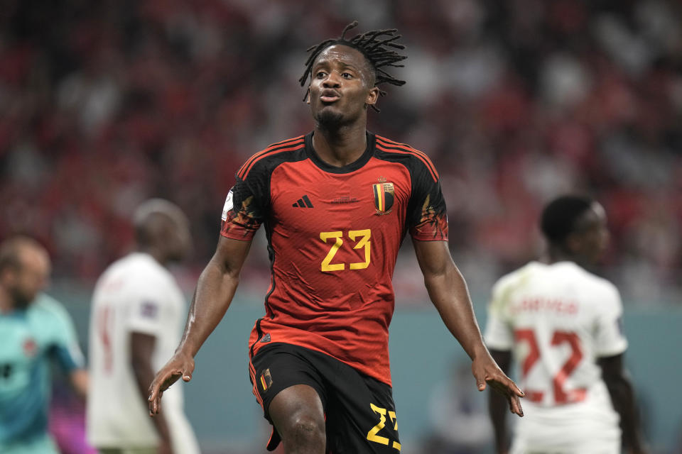 Belgium's Michy Batshuayi celebrates after scoring his side's opening goal during the World Cup group F soccer match between Belgium and Canada, at the Ahmad Bin Ali Stadium in Doha, Qatar, Wednesday, Nov. 23, 2022. (AP Photo/Hassan Ammar)