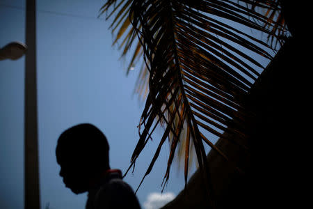 Lucasse Charnel, who was deported back to Haiti from the United States, poses for a portrait at the house where he lives, in Port-au-Prince, Haiti, January 30, 2017. Picture taken January 30, 2017. REUTERS/Andres Martinez Casares