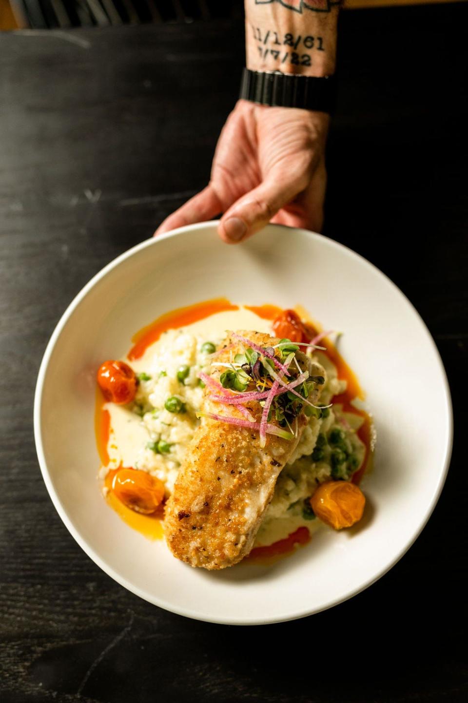 Parmesan-crusted halibut with risotto and citrus beurre blanc at The Squire at Branches in West Long Branch.