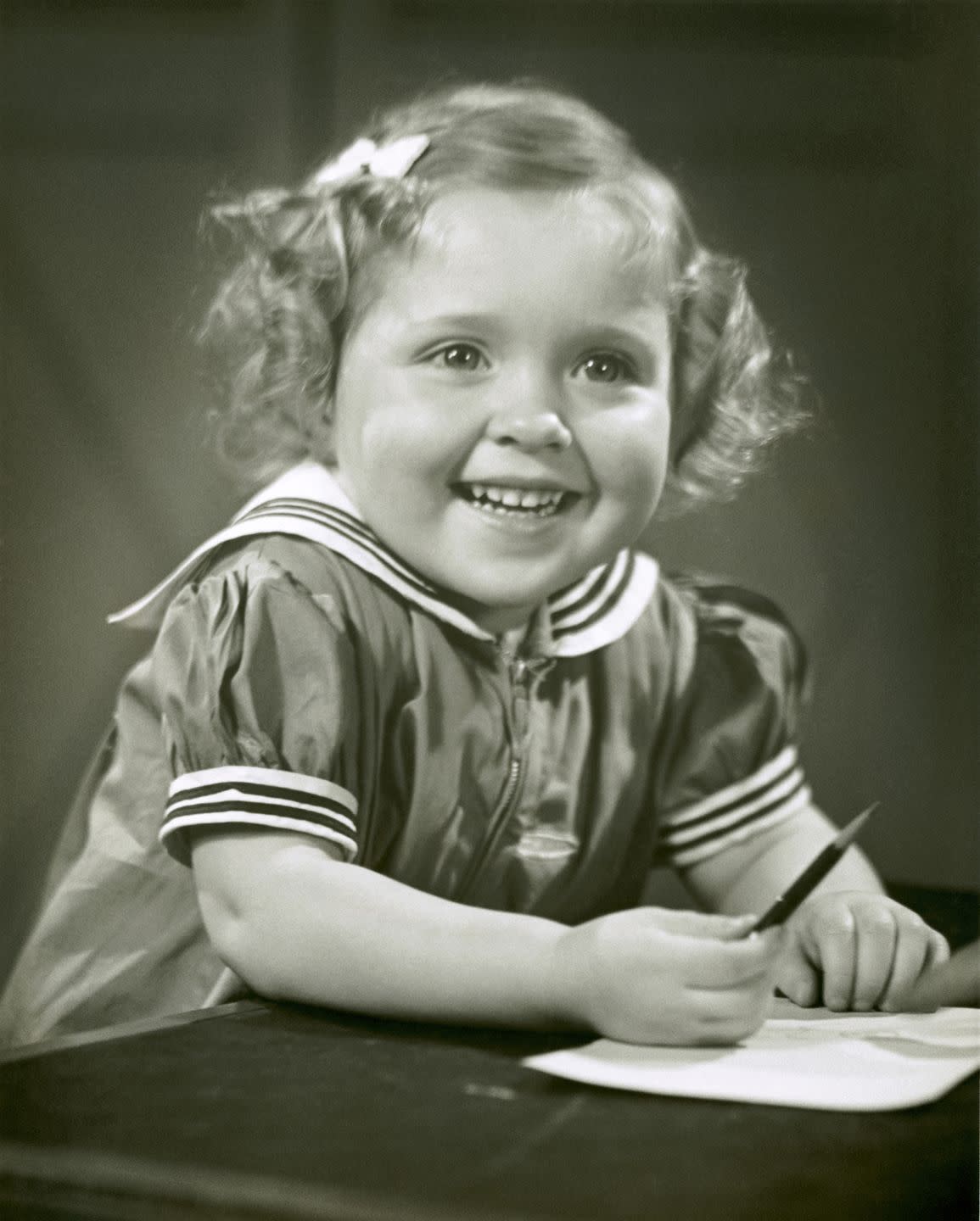 girl sitting at desk