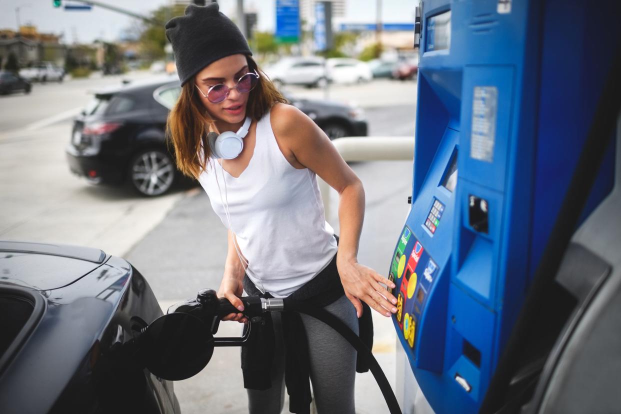 woman at the gas station