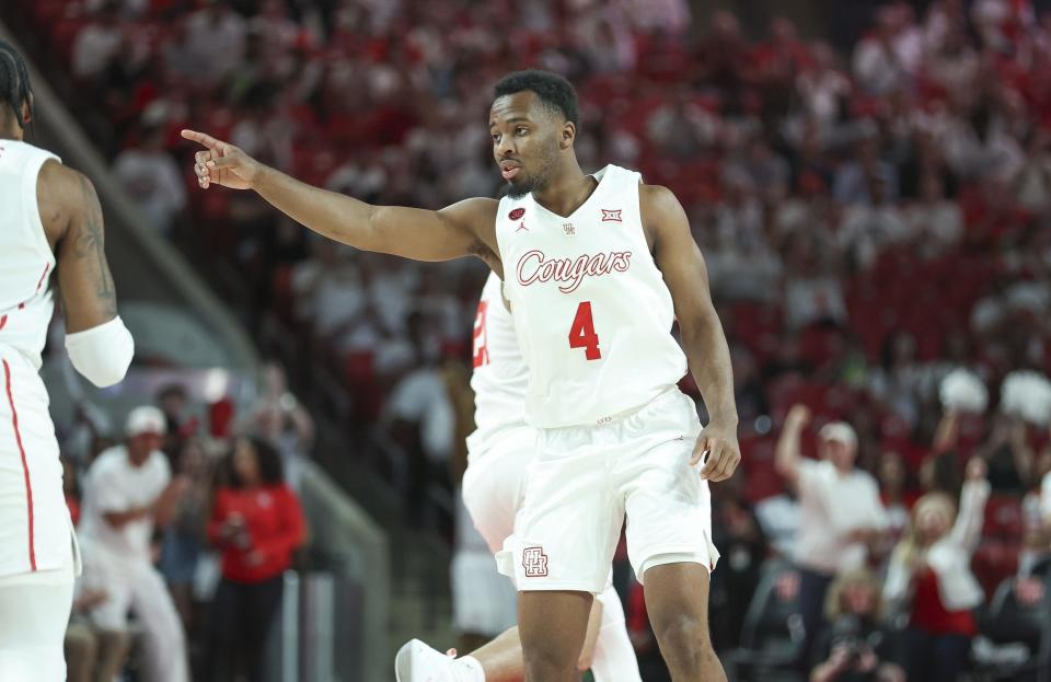 Feb 27, 2024; Houston, Texas, USA; Houston Cougars guard L.J. Cryer (4) reacts after making a basket during the first half against the Cincinnati Bearcats at Fertitta Center. Mandatory Credit: Troy Taormina-USA TODAY Sports