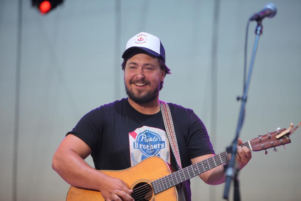 Adam Greuel of Wisconsin bluegrass band Horseshoes & Hand Grenades performed some songs alongside Charlie Berens during Berens' Wisconsin State Fair show on August 10, 2022. The two have released an album together, "Unthawed."