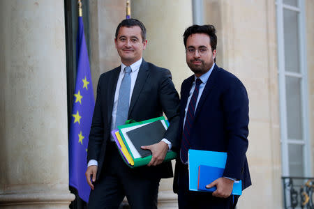 Gerald Darmanin, French Minister of Public Action and Accounts, and Mounir Mahjoubi, Junior Economy Minister in Charge of Digital, arrive to attend the weekly cabinet meeting at the Elysee Palace in Paris, France, October 17, 2018. REUTERS/Gonzalo Fuentes