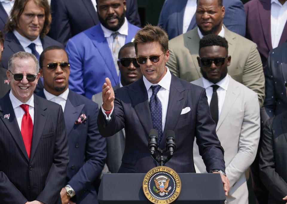 Tampa Bay Buccaneers quarterback Tom Brady speaks on the South Lawn of the White House, in Washington, Tuesday, July 20, 2021, during a ceremony to honor the Super Bowl Champion Tampa Bay Buccaneers for their Super Bowl LV victory. (AP Photo/Andrew Harnik)