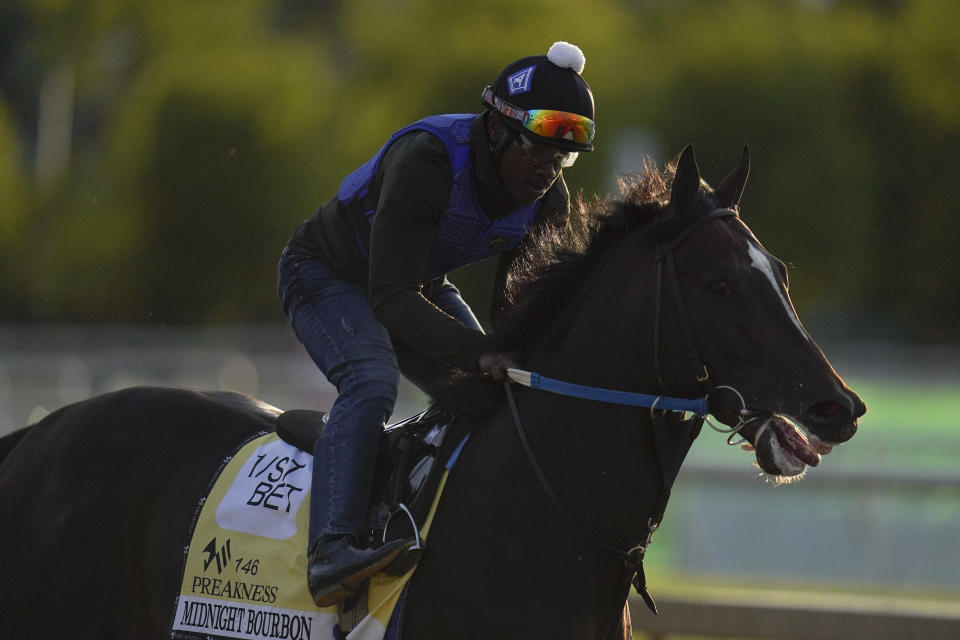 Preakness entrant Midnight Bourbon works out during a training session ahead of the Preakness Stakes horse race at Pimlico Race Course, Wednesday, May 12, 2021, in Baltimore. (AP Photo/Julio Cortez)