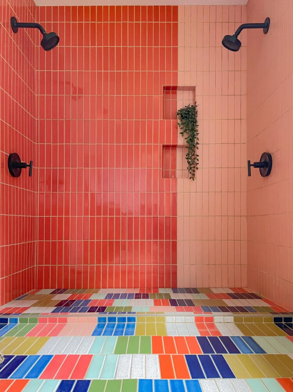 Bright red bathroom tiles with a multicolored floor