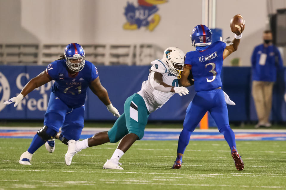 Coastal Carolina EDGE Tarron Jackson (9) had a big game against Kansas with five quarterback hits. (Photo by Scott Winters/Icon Sportswire via Getty Images)