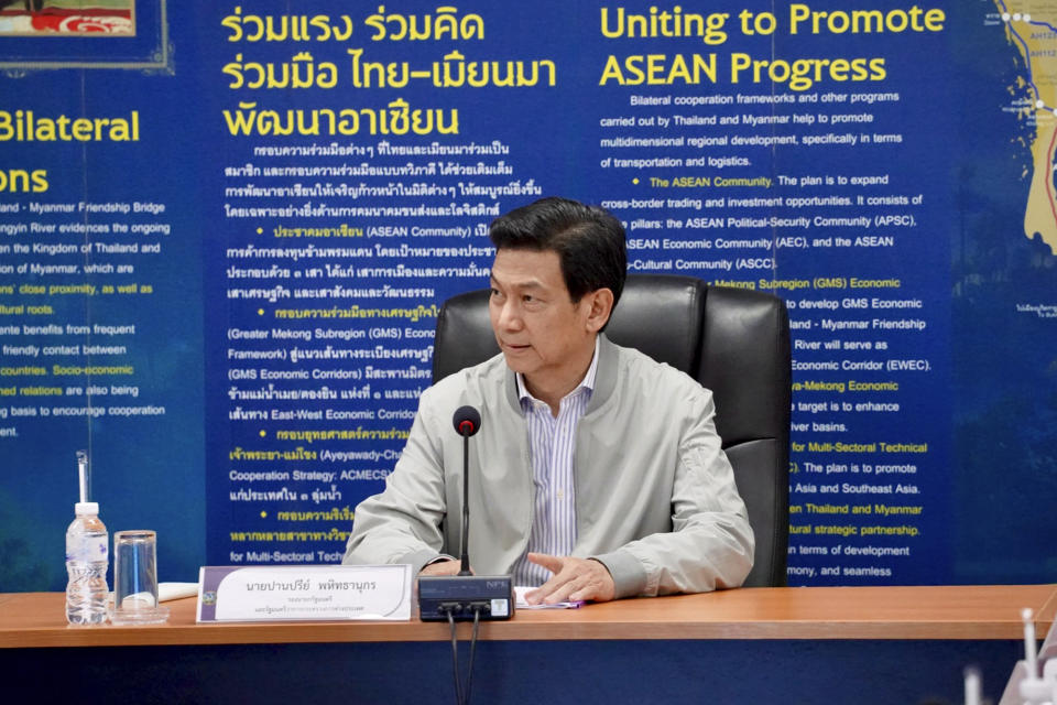 Thailand's Foreign Minister Parnpree Bahiddha-Nukara meets the media at a customs checkpoint near the border with Myanmar, in Mae Sot, Thailand on Thursday, Feb. 8, 2024. Parnpree was inspecting the area, which will be a staging point for sending cross-border humanitarian assistance to war-wracked Myanmar, which he said would begin in about a month. (AP Photo/Jintamas Saksornchai)