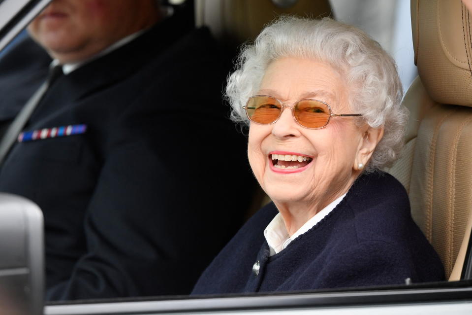 investment trusts Britain's Queen Elizabeth reacts in a car on the day of the Royal Windsor Horse Show Platinum Jubilee Celebration in Windsor, Britain, May 13, 2022. REUTERS/Toby Melville