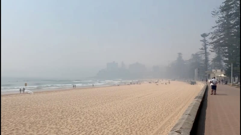 Still image taken from a social media video shows haze blanketing Manly Beach in Sydney, Australia