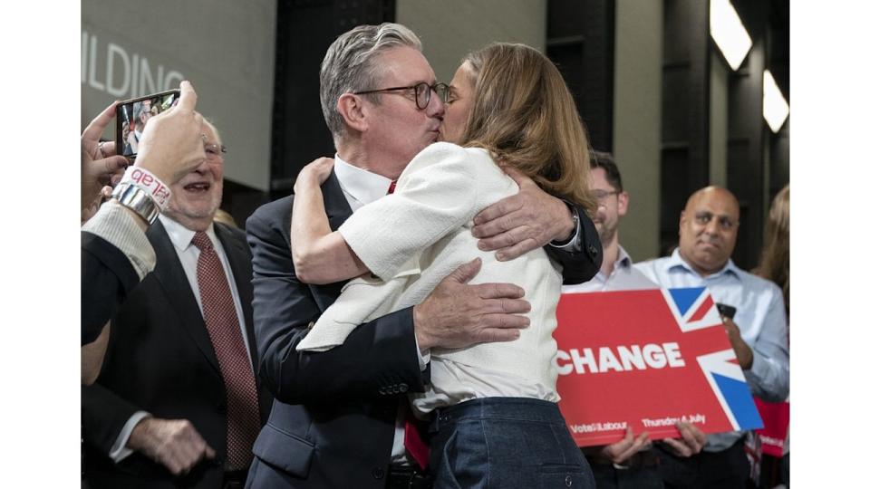 Labour leader Sir Keir Starmer embraces his wife Victoria