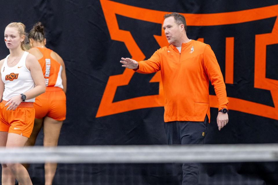 OSU tennis coach Chris Young at the Oklahoma State Cowgirls vs Michigan Wolverines Tennis Match, Friday, January 19, 2024, Greenwood Tennis Center, Stillwater, OK. Bruce Waterfield/OSU Athletics