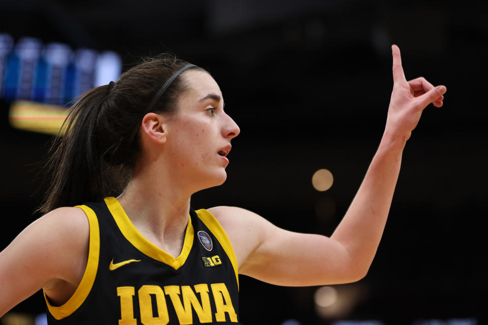 CLEVELAND, OHIO - APRIL 07: Caitlin Clark #22 of the Iowa Hawkeyes reacts in the second half during the 2024 NCAA Women's Basketball Tournament National Championship game against the South Carolina Gamecocks at Rocket Mortgage FieldHouse on April 07, 2024 in Cleveland, Ohio. (Photo by Steph Chambers/Getty Images)