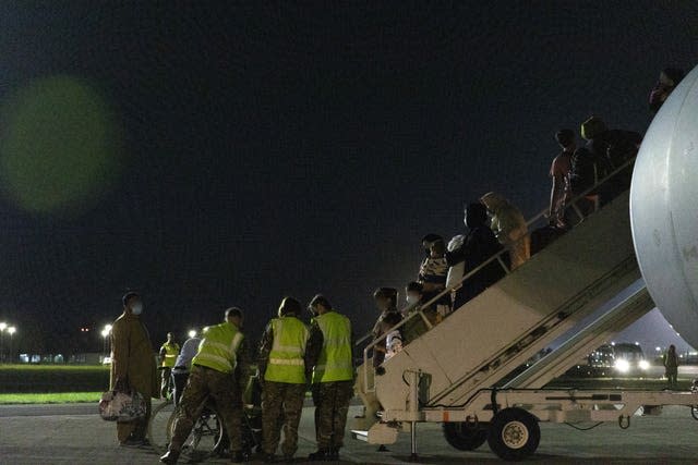 Passengers disembarking a Royal Air Force Voyager after arriving at RAF Brize Norton (SAC Samantha Holden RAF/PA)