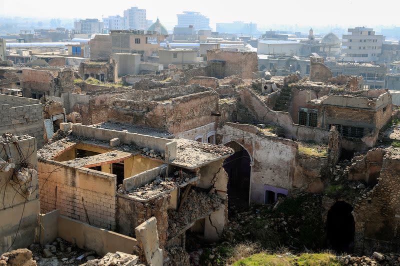 A view of the old city of Mosul and buildings destroyed during past fighting with Islamic State militants