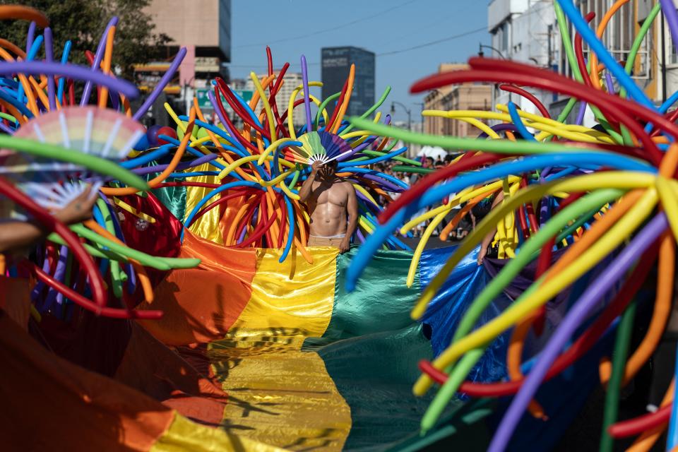 Members of the LGBTQ community take part in the Pride Parade in Tijuana on Saturday.